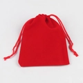 Detailed close-up of a premium red velvet jewelry pouch with a secure drawstring closure - Velvet Bag Red 10X12cm
