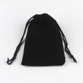 Macro shot of high-quality black velvet drawstring pouch for jewelry storage and gifts - Velvet Bag Black 7X9cm