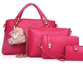 Fuchsia 4-piece handbag set featuring embossed O-patterns and cute bear charm accessory - Rose Red