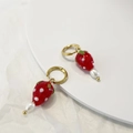 Close-up of strawberry glass earring with freshwater pearl and golden hoop detail - Lampwork Strawberry Stainless Steel Ear Buckle