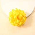 Detailed close-up of a bright yellow grosgrain ribbon flower hair accessory with high texture - Yellow