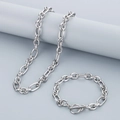 Vista dettagliata del set di collana e bracciale a catena spessa in argento con chiusura OT - Bracciale Argento / 21cm