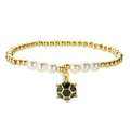 Armband aus goldenen Perlen und weißen Perlen mit einem schwarzen Schildkrötenanhänger - Schwarze Schildkröte