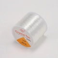 Macro shot of 0.5mm clear elastic beading cord on a 100m spool by Crystal Tec - 0.5mm - 100m