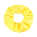 Detailed close-up of glossy yellow satin scrunchie fabric texture and pleated design - Yellow
