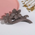 Detail shot of a matte brown flower hair claw with floral and leaf-vein design - 11CM Matte Dark Coffee 01 (Two Flowers)