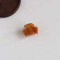 Mini amber marble pattern cellulose acetate hair claw clip for bangs and styling - Caramel color