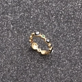 Bohemian gold plated evil eye ring featuring colorful zircons on a sparkling black background - CR005A Evil Eye Style