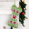 Knitted bone-shaped Christmas pet stocking with paw prints hanging on white fireplace - Bone Shape-Red Paw / Knitted Bone Stocking White Green-Red Paw