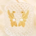 Golden wing petal earrings with white pearls on a textured glass rim and silk background - Gold (KE113150-KFC)