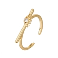 Detail of gold adjustable ring with eye motif, arrow element and sparkling zircon stone - Adjustable Open / Eye Pattern With Bow And Arrow (369)