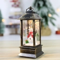 Vintage schwarz-goldene Laterne mit Schneemann, Weihnachtsbaum und warmem Lichtdekor - Innen Schneemann