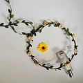 Floral garland headpiece with light yellow rose blossoms and green leaves on brown vine - Champagne