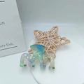 Pince à cheveux ondulée en acétate coloré avec motif marbré semi-transparent - Bleu coloré 6cm