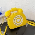 Vibrant yellow retro rotary telephone crossbody bag with creative heart dial and top handle - Yellow