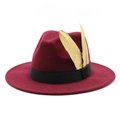 Detail of burgundy wool fedora hat with black ribbon and golden feathers accessory - M (56-58cm) / Burgundy