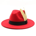 Detail of red wool felt fedora featuring black ribbon and two gold feather accents - M (56-58cm) / Red