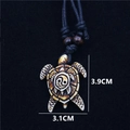 Yin Yang sea turtle pendant necklace made of resin with black woven cord and wood beads - Brown