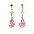 Close-up of 18K gold earrings with pink teardrop crystal and hollow floral base - Pink