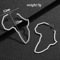 Detail view of silver Africa map hoop earrings with 72mm height and 53mm width dimensions - Height 72mm / Steel