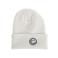 Winter knitted beanie in cream white with a black smiley face embroidery and folded cuff - White