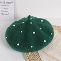 Dark green kids beret with white pearls on straw mat and vintage paper background - One Size / Dark Green