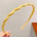 Sweet candy-colored yellow wavy headband for women made of glossy durable resin material - Yellow