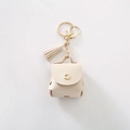 Mini beige faux leather earphone case keychain with tassel for Airpods and small items - Beige