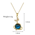 Titanium butterfly necklace with blue star stone and gold planetary ring pendant - Gold Butterfly Blue Planet Style