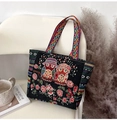 Ethnic black tote bag featuring colorful owl embroidery and geometric pattern straps - Vintage Blue Owl Red Flower