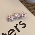 Close-up of stars hair clip with pink heart-shaped crystals and white enamel on silver base - Triple Star Enamel Clip