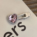 Close-up of pink heart rhinestone hair clip with sparkling crystals on silver duckbill base - Heart Main Stone Luxury Clip