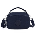 Dark blue nylon crossbody bag with top handle and multiple zippered compartments - Deep Blue