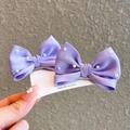Detail of purple satin bow hair clips with white pearls and metal duckbill clips - Purple Pair