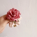 Pink satin rose scrunchie with green leaf detail and gold bell on a cream headband - Burning Edge Flower