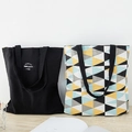 Dual-sided canvas tote bags in black and geometric patterns for shopping and storage - Black Yellow Triangle