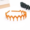 Matte bright orange wavy hairband with zig-zag teeth for secure hold and daily styling - Wave Wide Tooth / Goose Yellow