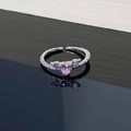 Macro detail of silver adjustable ring with pink heart zircon and angel wings design - Style 4 Heart Wings Ring