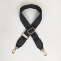 Detail of black adjustable canvas shoulder strap with gold metal lobster clasps and buckles - Black / Silver
