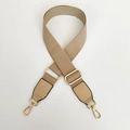 Detail of adjustable beige canvas strap with gold metal lobster hooks and leather ends - Khaki / Silver