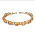Pulsera chapada en oro de 18k con gemas de citrino amarillo ovaladas y tréboles - Pulsera