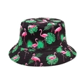 Detailed close-up of tropical flamingo and palm leaf print on a black cotton bucket hat - M / Black