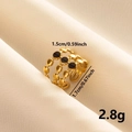 Detail view of gold triple-layer hollow ring with black enamel dots and size dimensions - Gold + Black