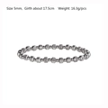 Detail of 5mm silver stainless steel beaded bracelet showing textured surface and dimensions - 5mm