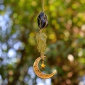 Detail of handmade woven crystal pendant featuring moon star charm and raw amethyst stones - Amethyst + Citrine (Gold Accessories)