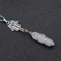 Detail of Hamsa Hand charm and wire-wrapped pink crystal hexagonal pillar pendant - Hamsa Hand + Clear Quartz