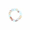 Detailed macro of 4mm light blue and marbled natural stone beads on elastic cord - Shoushan Stone