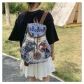 Ethnic canvas backpack with elephant embroidery shown from back on a female model outdoors - 40x30x16cm / Elephant Pair Style