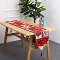 Detailed view of red Christmas table runner with festive patterns and decorative tassels - Style E Red Snowing