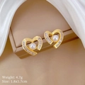 Detail of gold heart earring with center pearl and rectangular zircon stones - Gold Stud Earrings (S925 Silver Pin Copper Gold Plated)